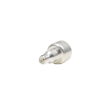 Adaptador UNIDAPT Hembra a SMA Hembra. Plata / Oro / Teflón.